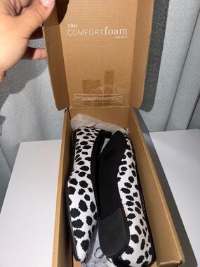 Rothy's Black and White Spot Knit Slip-On Flats